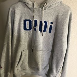 hoodie with “badminton” on sleeves